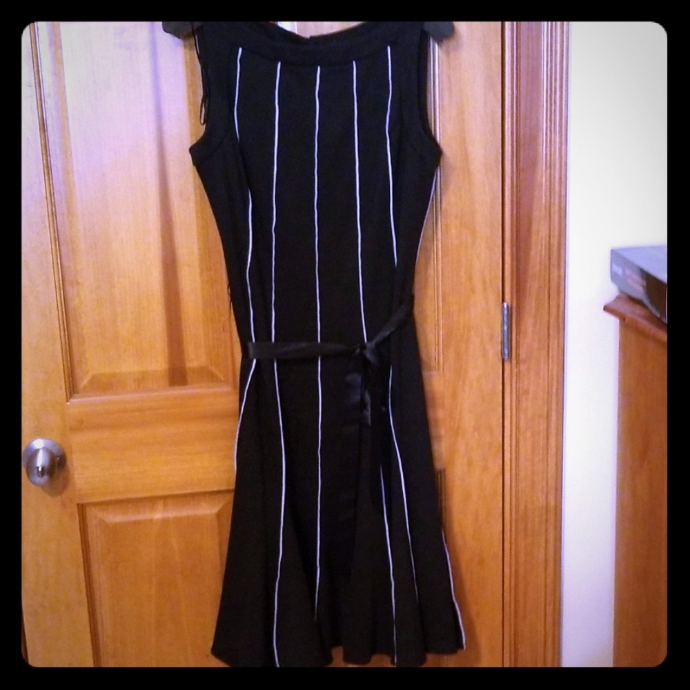 Black dress with white details. Size 12